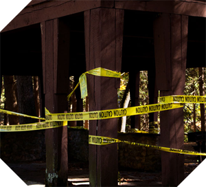 caution tape enclosing an outdoor pavilion